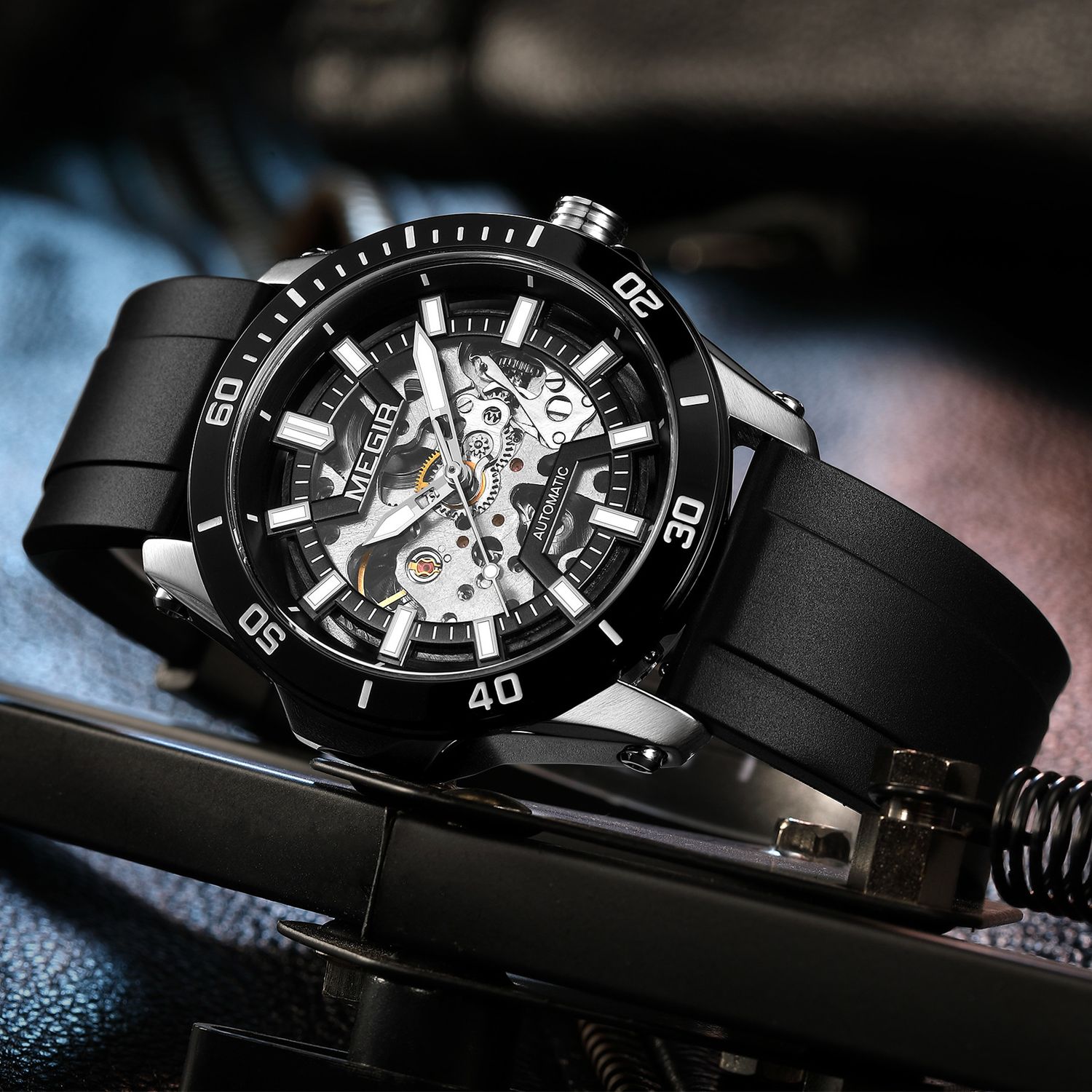 MEGIR 8605 skeleton automatic watch, black case and black strap, styled beauty shot
