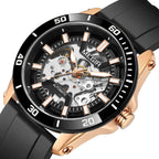 MEGIR 8605 skeleton automatic watch, rose-gold case, black bezel and black strap, side angle view