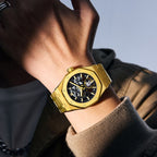 MEGIR 9005-4 skeleton automatic watch on the wrist, gold octagonal case and integrated gold bracelet