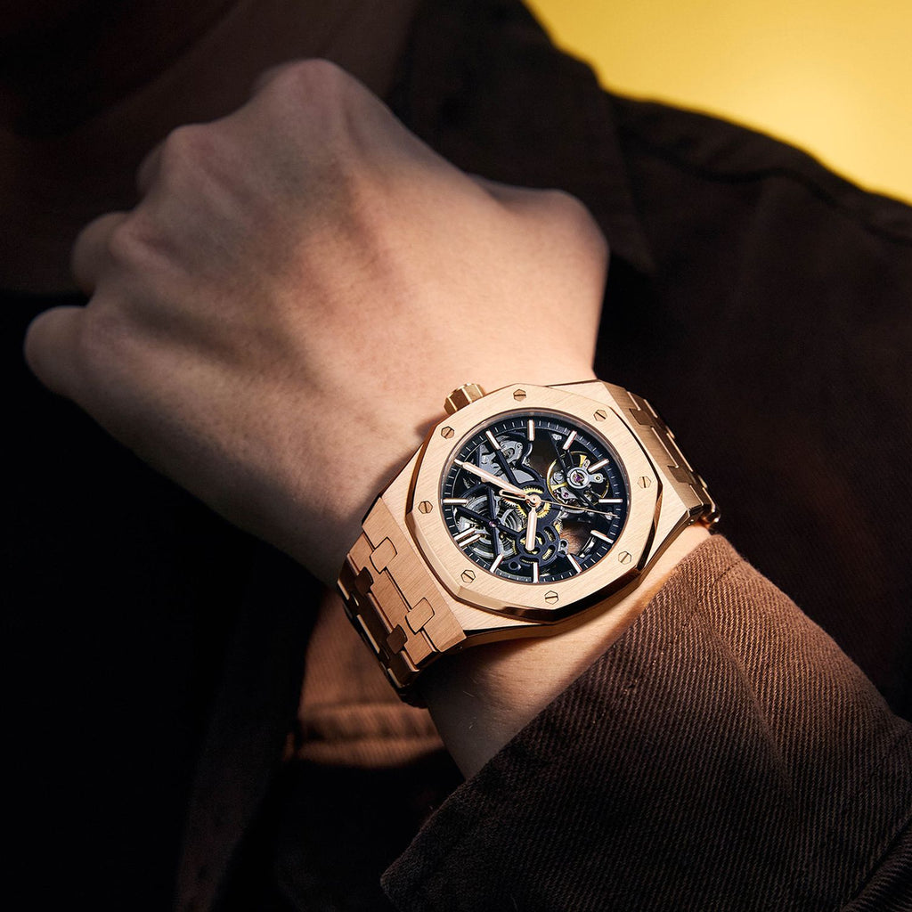 MEGIR 9005-4 skeleton automatic watch on the wrist, rose-gold case and integrated rose-gold bracelet