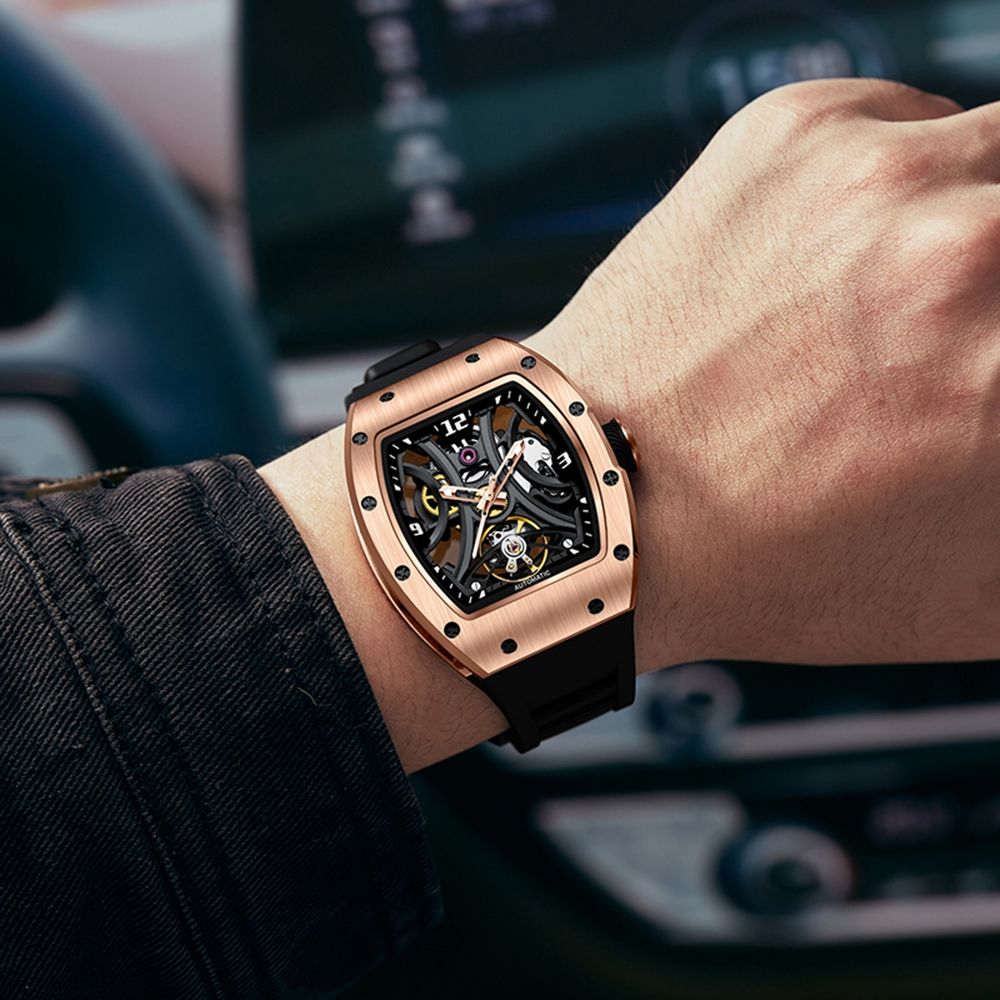 MEGIR 9190-11 skeleton automatic watch on the wrist, rose-gold case and black silicone strap