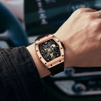 MEGIR 9190-11 skeleton automatic watch on the wrist, rose-gold case and black silicone strap