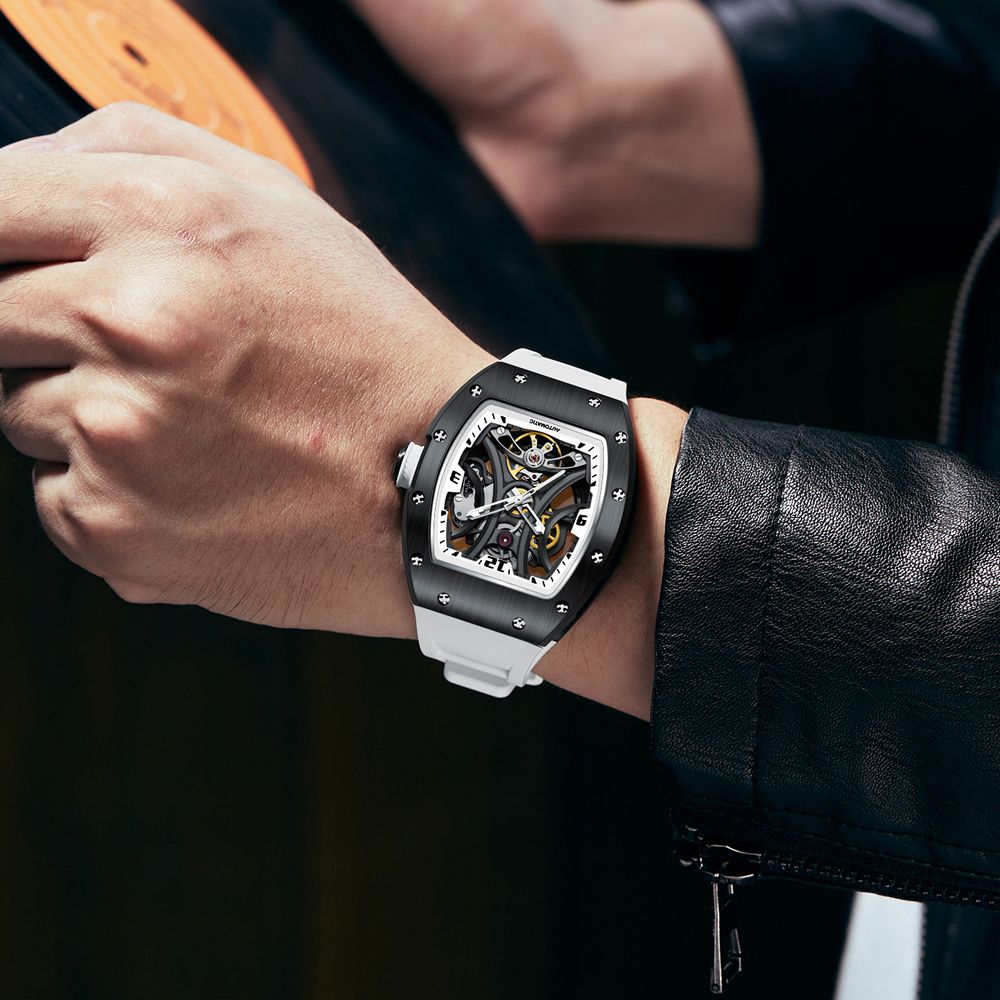 MEGIR 9190-11 skeleton automatic watch on the wrist, black case and white silicone strap