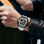 MEGIR 9190-11 skeleton automatic watch on the wrist, black case and white silicone strap
