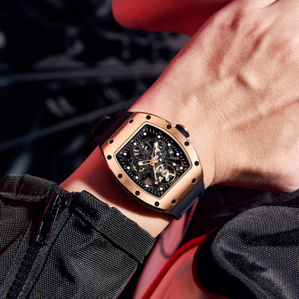 MEGIR 9190-12 skeleton automatic watch on the wrist, rose-gold case and black silicone strap
