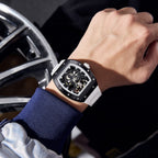 MEGIR 9190-12 skeleton automatic watch on the wrist, black case and white silicone strap