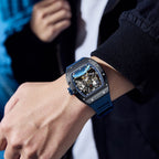 MEGIR 9190-14 space skeleton automatic watch on the wrist, black case, astronaut dial and blue silicone strap