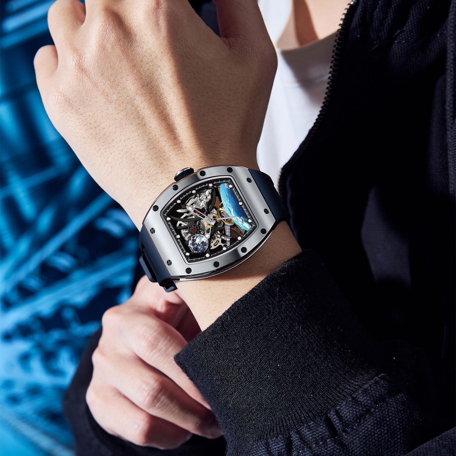 MEGIR 9190-14 space skeleton automatic watch on the wrist, silver case, astronaut dial and black silicone strap