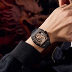 MEGIR 9190-15 dragon skeleton automatic watch on the wrist, black case, rose-gold dragon dial and black strap