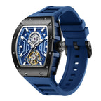 MEGIR 9190-28 skeleton automatic watch, black case, blue dial and blue silicone strap, angled view