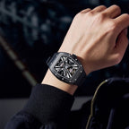 MEGIR 9190-4 skeleton automatic watch on the wrist, black case and black silicone strap
