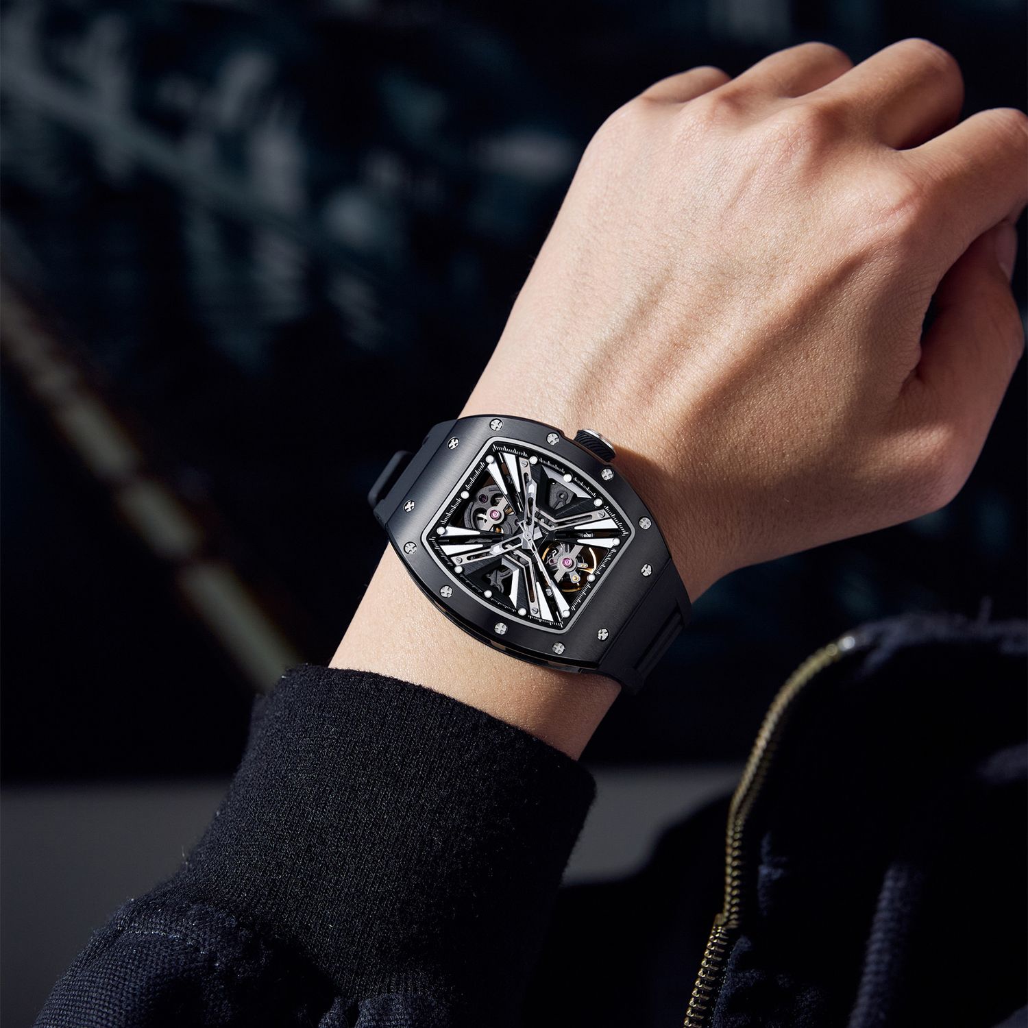 MEGIR 9190-4 skeleton automatic watch on the wrist, black case and black silicone strap