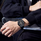 MEGIR 9190-5 spider skeleton automatic watch on the wrist, black case and black silicone strap