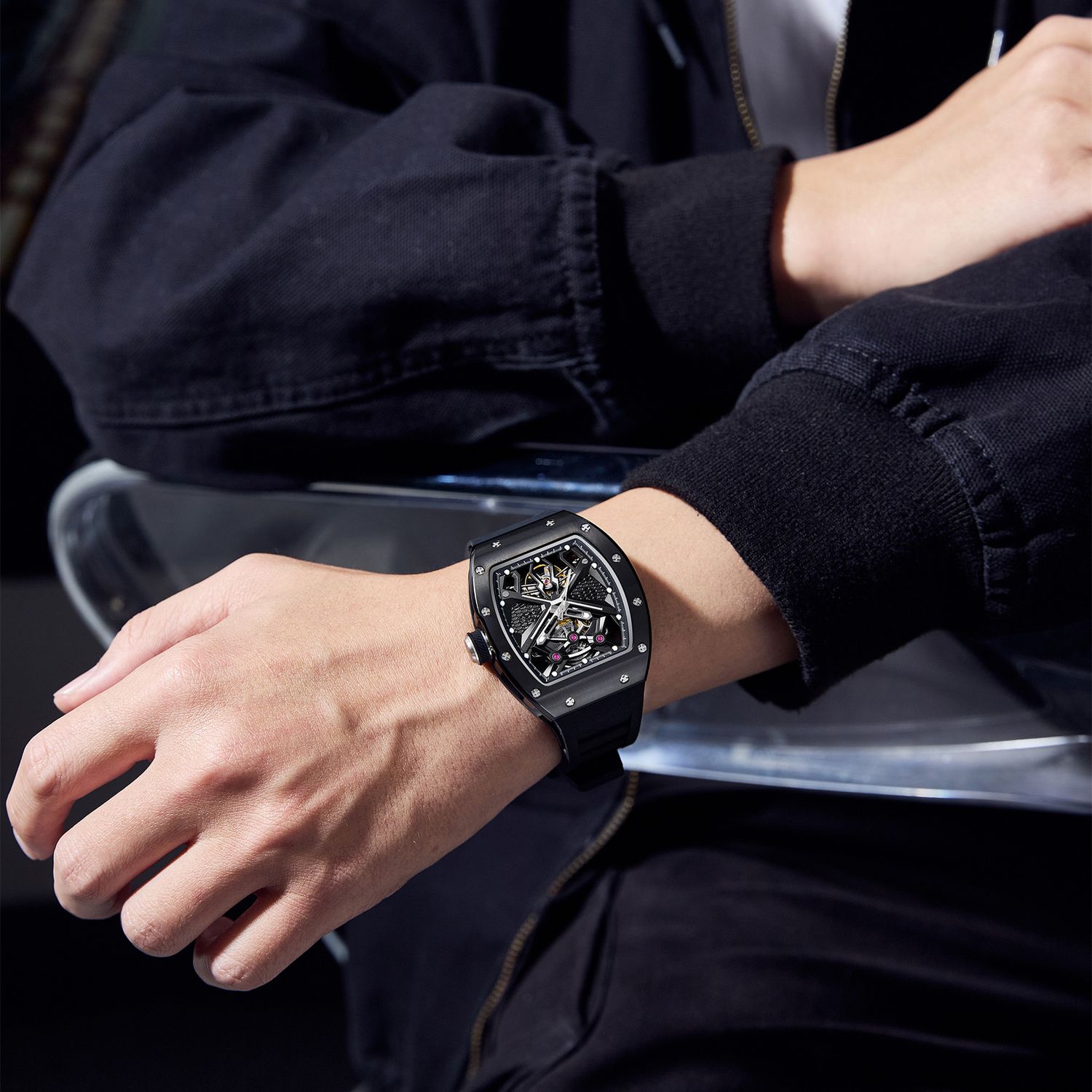 MEGIR 9190-5 spider skeleton automatic watch on the wrist, black case and black silicone strap