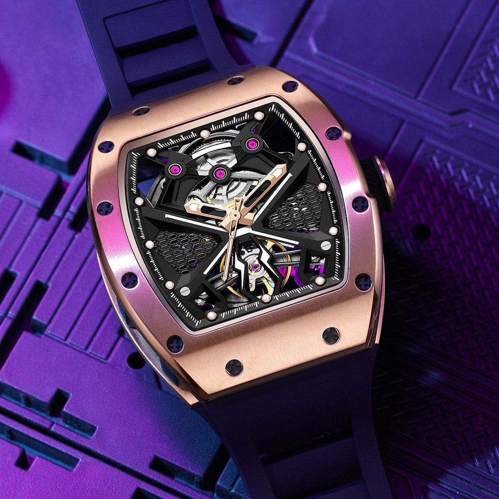 MEGIR 9190-5 spider skeleton automatic watch, rose-gold case and black strap, purple-lit beauty shot