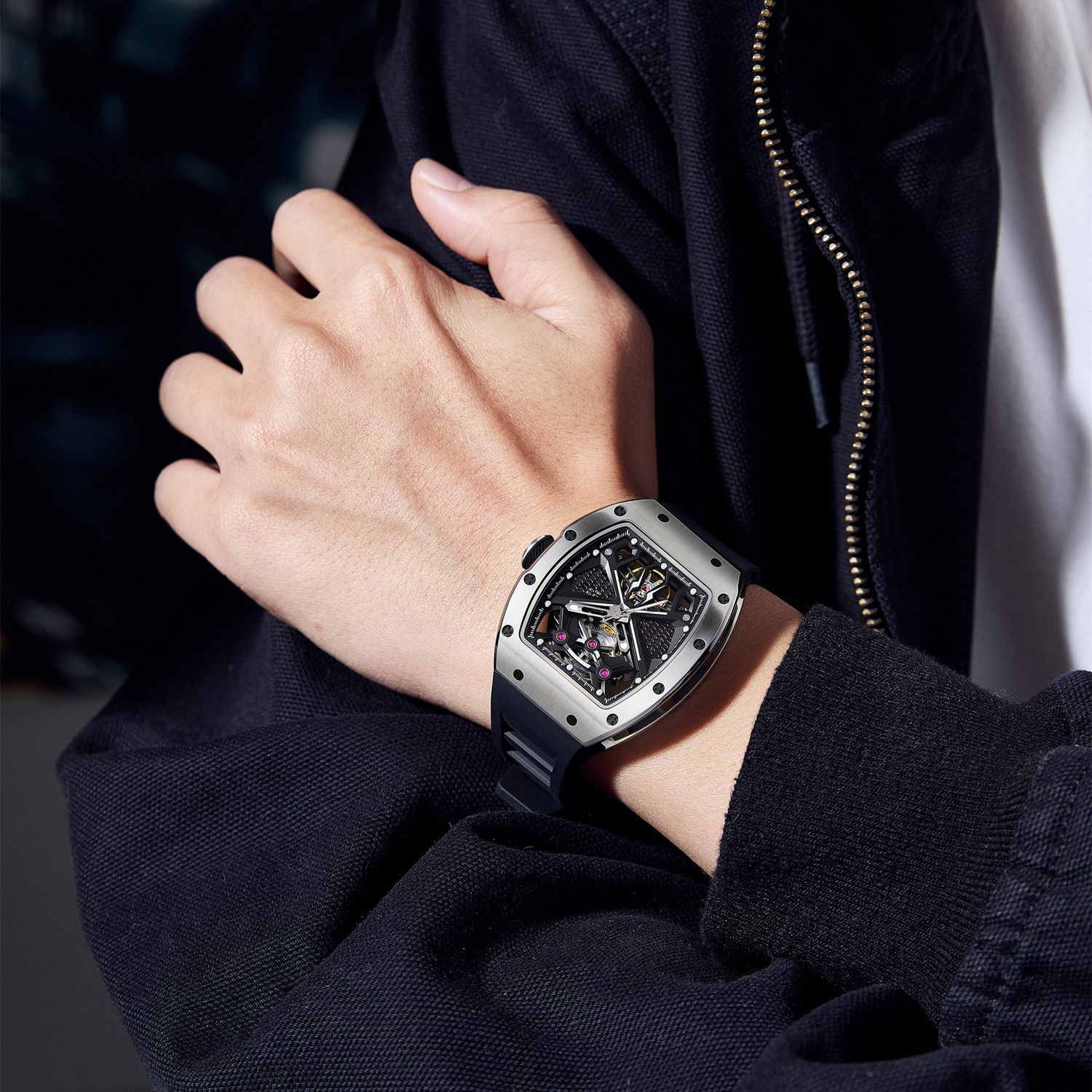 MEGIR 9190-5 spider skeleton automatic watch on the wrist, silver case and black silicone strap