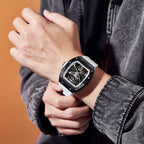 MEGIR 9190-5 spider skeleton automatic watch on the wrist, black case and white silicone strap