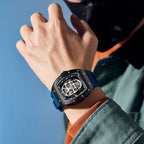 MEGIR 9190-7 skull skeleton automatic watch on the wrist, black case and blue silicone strap