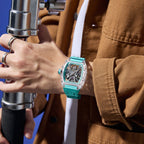 MEGIR 9195-11 skeleton automatic watch on the wrist, transparent case and light blue silicone strap