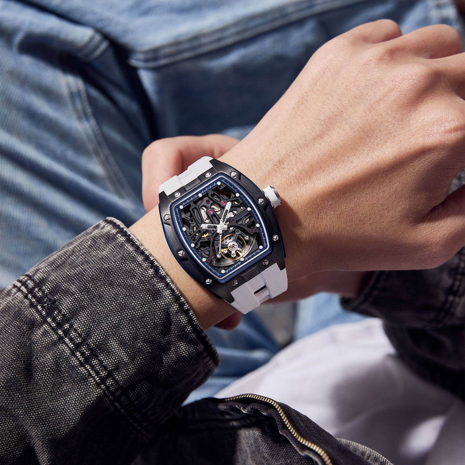 MEGIR 9198-1 skeleton automatic watch on the wrist, black case and white silicone strap