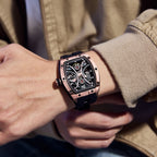MEGIR 9198-4 skeleton automatic watch on the wrist, rose-gold case and black silicone strap