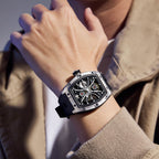 MEGIR 9198-4 skeleton automatic watch on the wrist, silver barrel case and black silicone strap