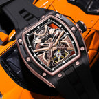 MEGIR 9198-5 samurai skeleton automatic watch, rose-gold case, styled beside an orange sports car