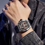 MEGIR 9198-5 samurai skeleton automatic watch on the wrist, silver barrel case and black silicone strap