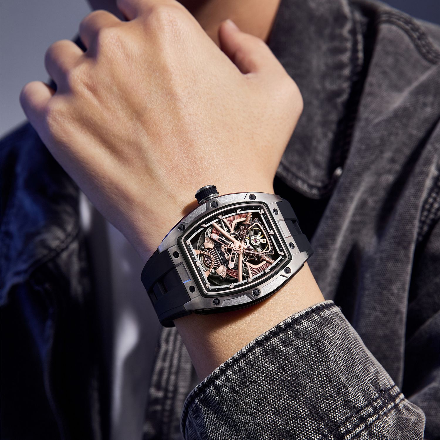MEGIR 9198-5 samurai skeleton automatic watch on the wrist, silver barrel case and black silicone strap