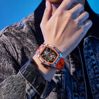MEGIR 9198-6 skeleton automatic watch on the wrist, orange case accents and orange silicone strap