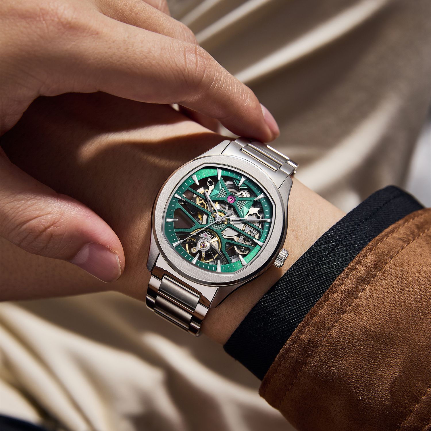 MEGIR 9204-5 skeleton automatic watch on the wrist, green openwork dial and steel bracelet