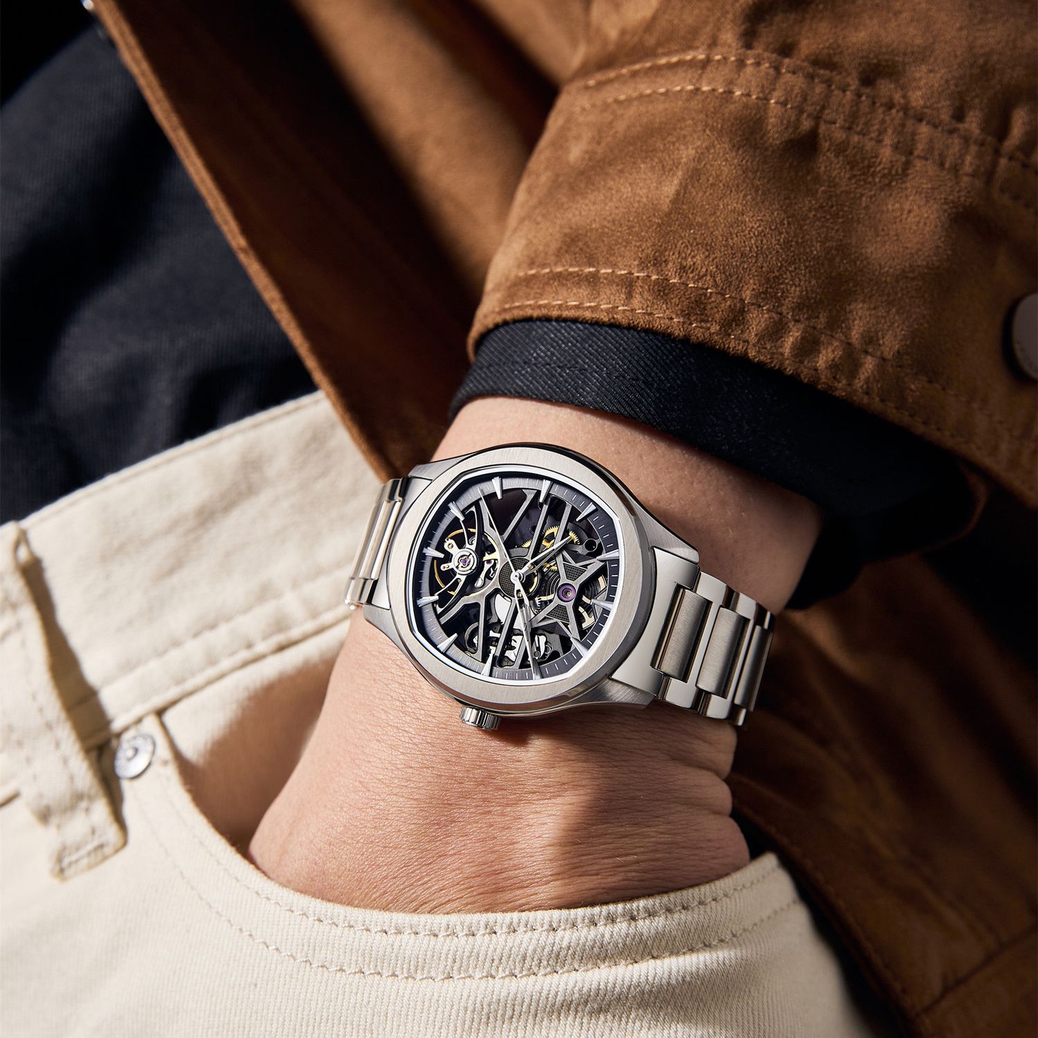 MEGIR 9204-5 skeleton automatic watch on the wrist, grey openwork dial and steel bracelet