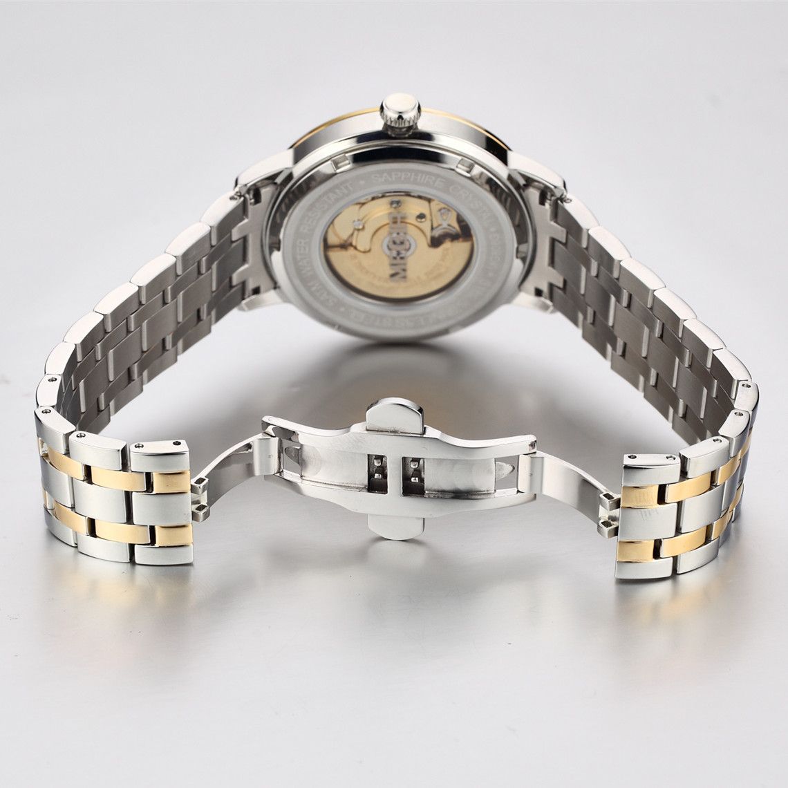 MEGIR 96001 automatic watch caseback with exhibition window showing the self-winding movement