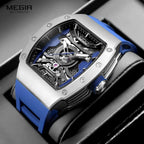 MEGIR MN8603GWE-7 automatic skeleton tonneau watch with blue strap on display pillow, detail