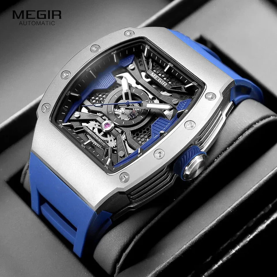MEGIR MN8603GWE-7 automatic skeleton tonneau watch with blue strap on display pillow, detail