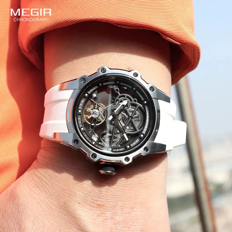 MEGIR men's skeleton automatic tourbillon watch with white strap on wrist with orange shirt