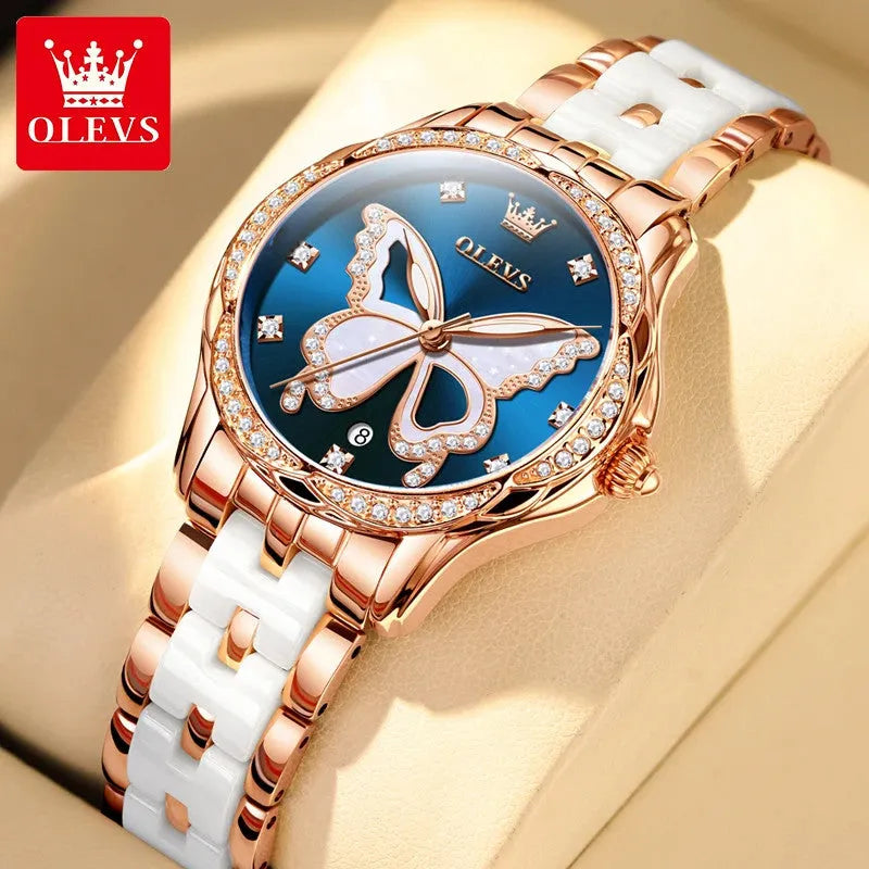 OLEVS butterfly diamond watch close-up with rose gold case blue dial and white butterfly motif