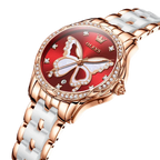 OLEVS Luxury Butterfly Diamond Rose Gold Women's Watch with red dial, shown on wrist