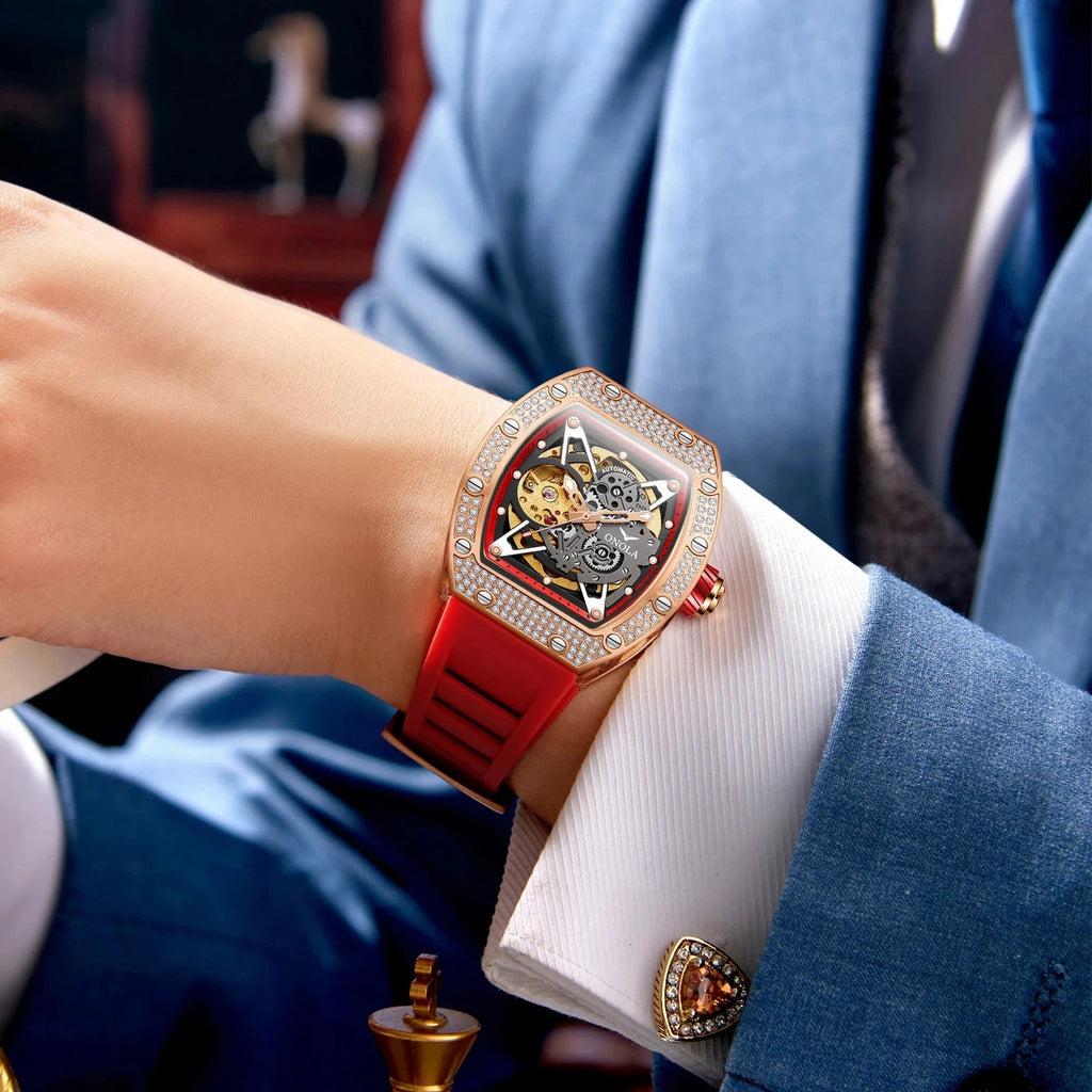 ONOLA ON3838D skeleton automatic watch with red dial and rose gold case on wrist