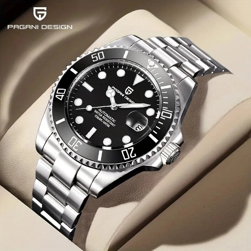 Angled view of Pagani Design PD-1639 mechanical automatic diver watch with black dial, ceramic bezel, stainless steel case and bracelet displayed on a beige cushion.