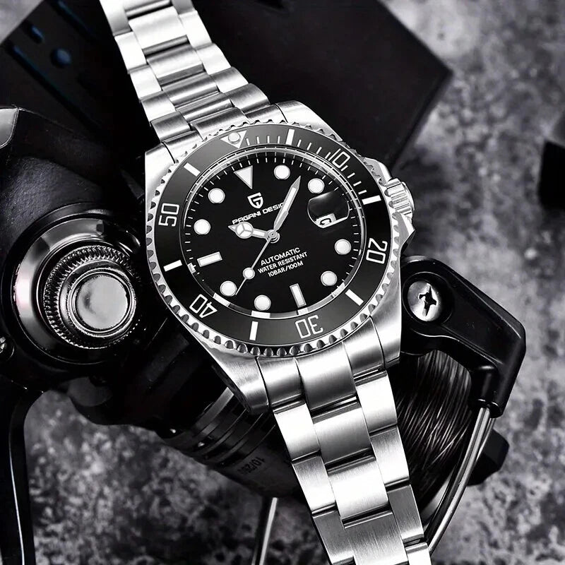 Lifestyle view of Pagani Design PD-1639 mechanical automatic diver watch with black dial, ceramic rotating bezel, and stainless steel bracelet resting on diving equipment.