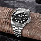 PAGANI DESIGN PD-1639 automatic diver watch with black dial on wooden log, lifestyle view