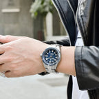 PAGANI DESIGN PD-1649 automatic watch lifestyle shot with blue dial worn with leather jacket