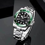 Pagani Design PD-1661 black dial with green bezel, angled studio shot showing brushed steel links