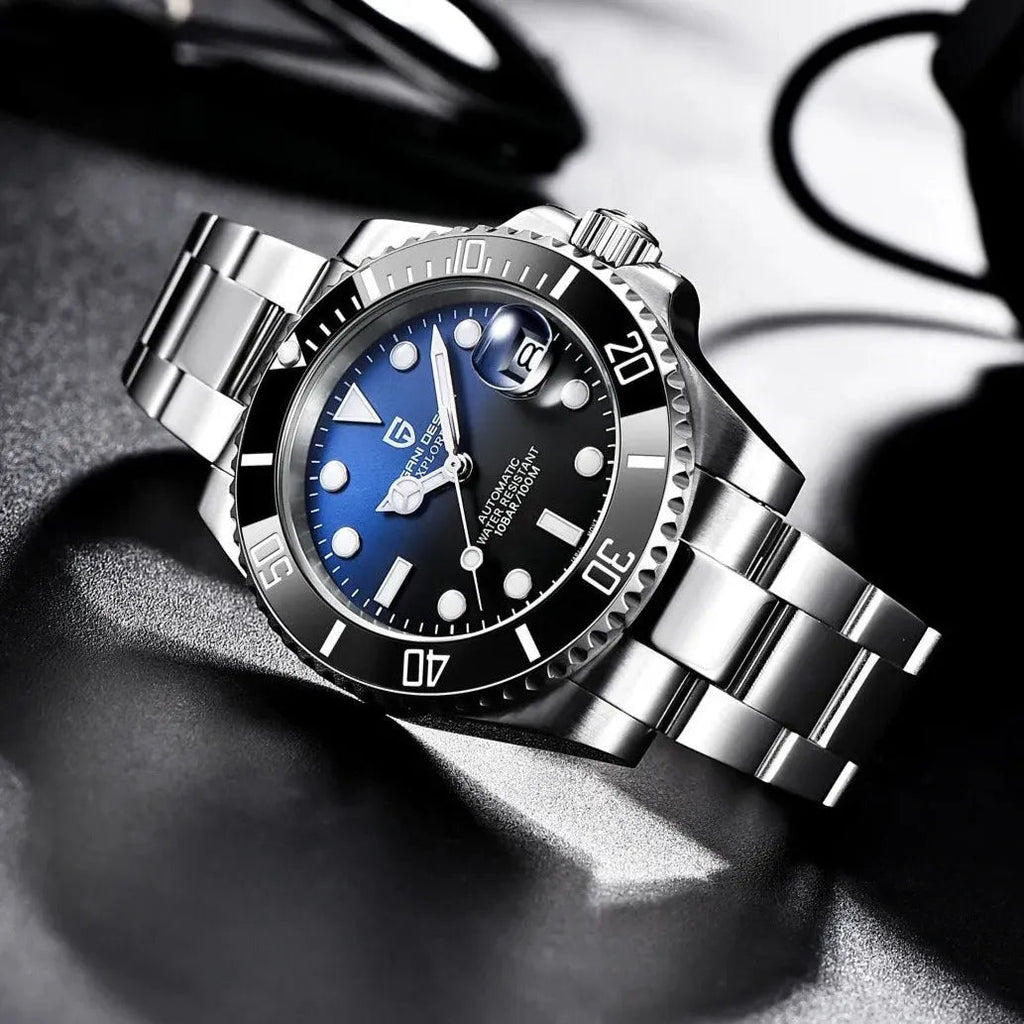 Pagani Design PD-1661 blue dial and black bezel viewed at an angle in low studio light