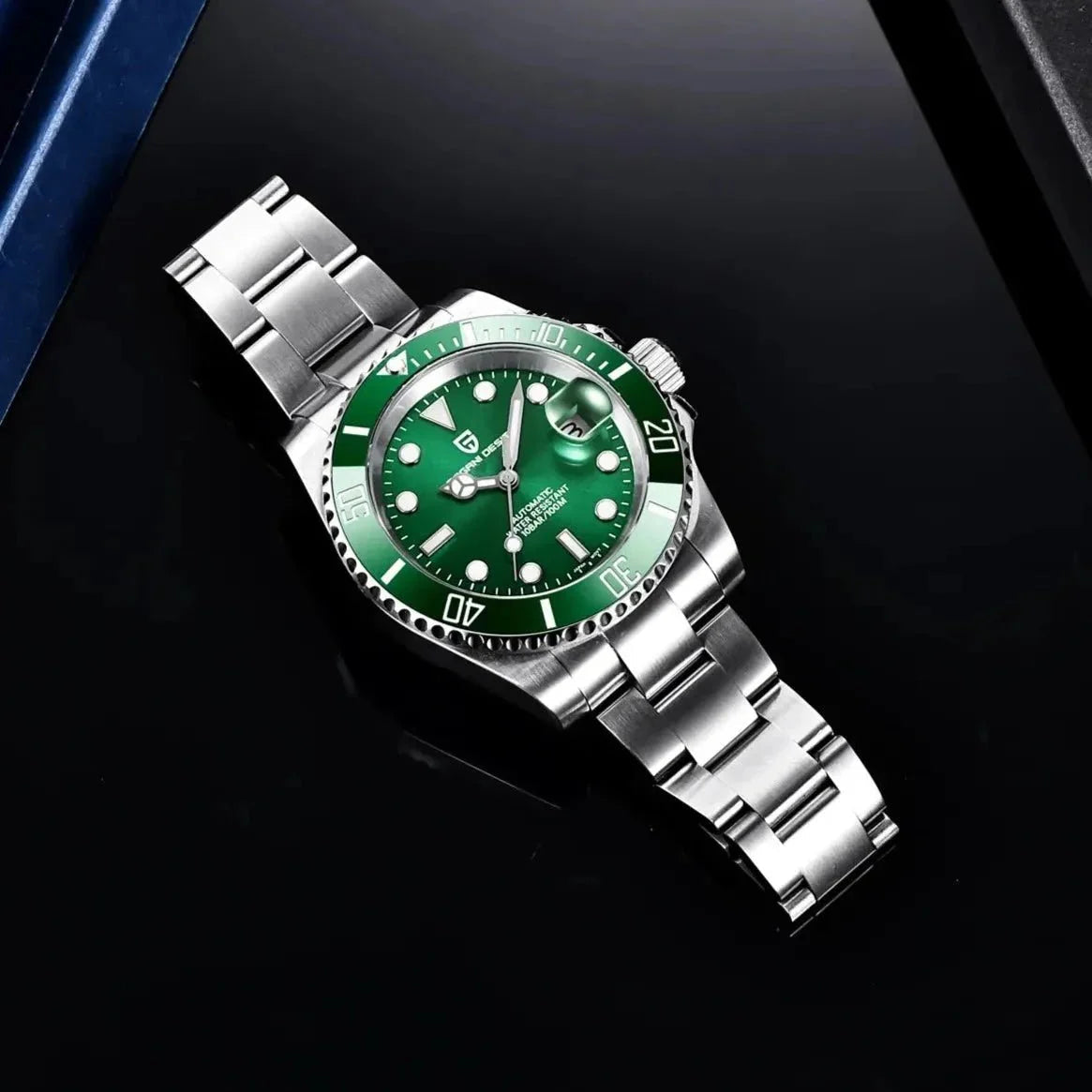 Pagani Design PD-1661 green dial dive watch laid flat, full steel oyster bracelet in view