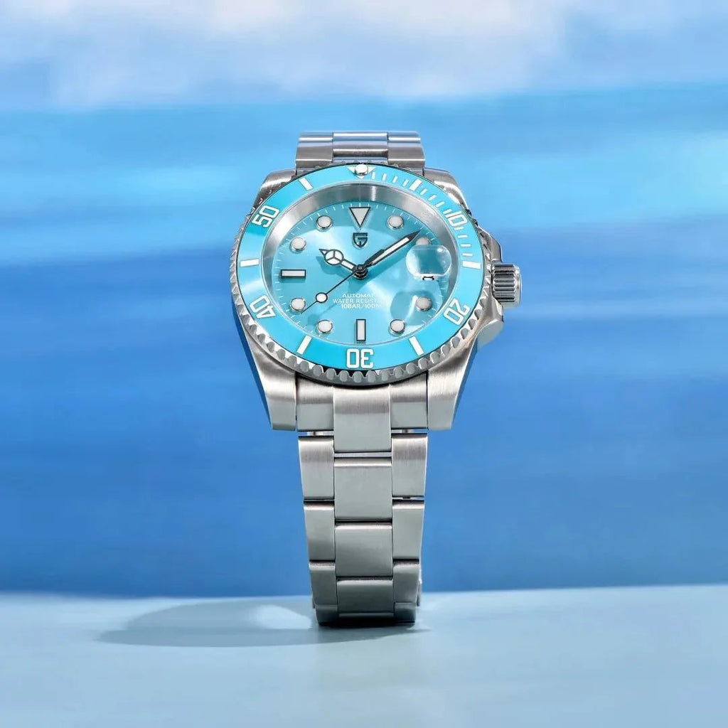 Pagani Design PD-1661 sky blue dial dive watch against a blue water backdrop, 100M rated