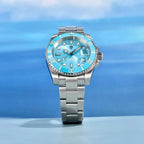 Pagani Design PD-1661 sky blue dial dive watch against a blue water backdrop, 100M rated