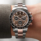 PAGANI Design PD-1664 chronograph with brown dial two-tone bracelet on wrist with sweater