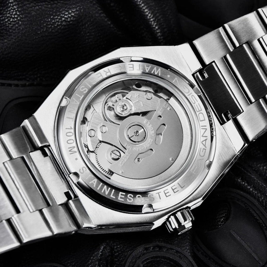 Pagani Design PD-1673 exhibition caseback showing the automatic movement and 100M steel case marks